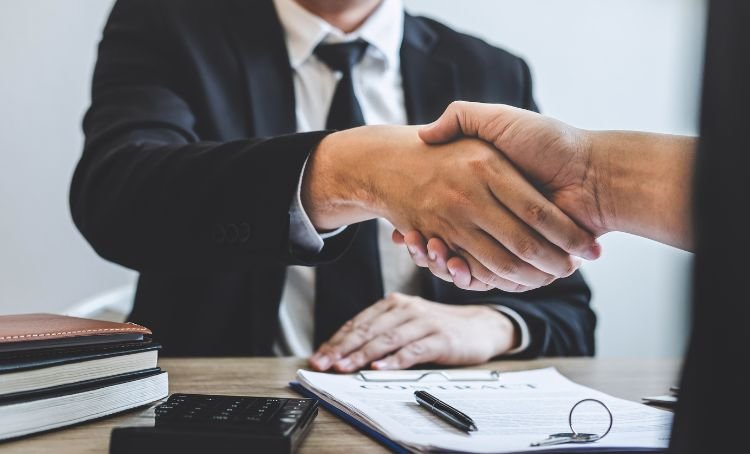 A lender shaking on a loan with a first time fix and flipper - ECF