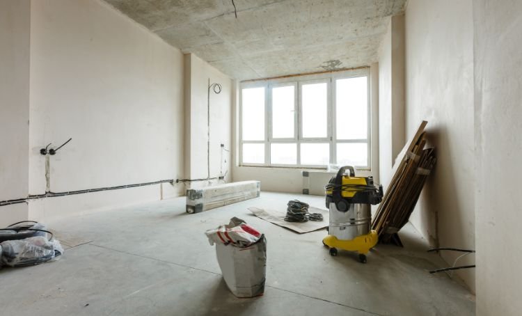 A room in a fix and flip being prepared for painting - ECF