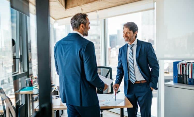 Property lender making a deal with an investor - FED Rate Cuts -Express Capital Financing
