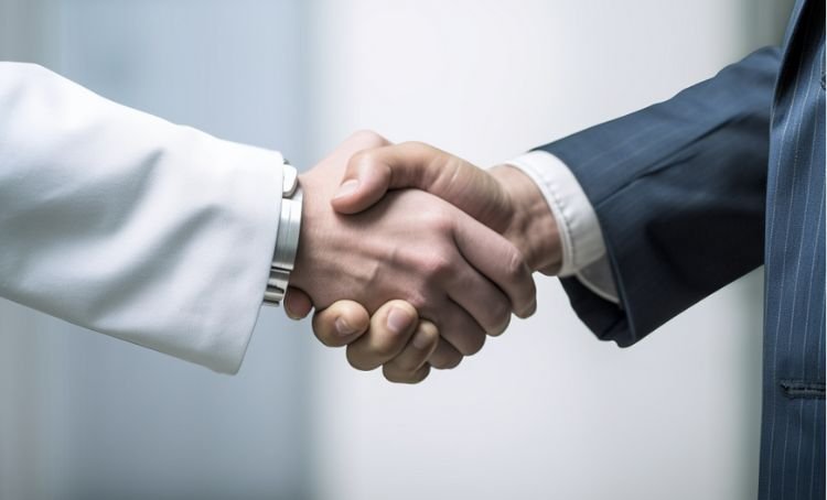 A property investory qualifying for a DSCR loan and shaking with the loan officer - Express Capital Financing