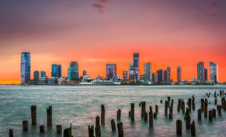 the New Jersey shoreline at sunset - rental loans - Express Capital Financing