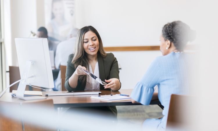 An Express Capital Financing loan officer negotiating a DSCR loan with a property investor