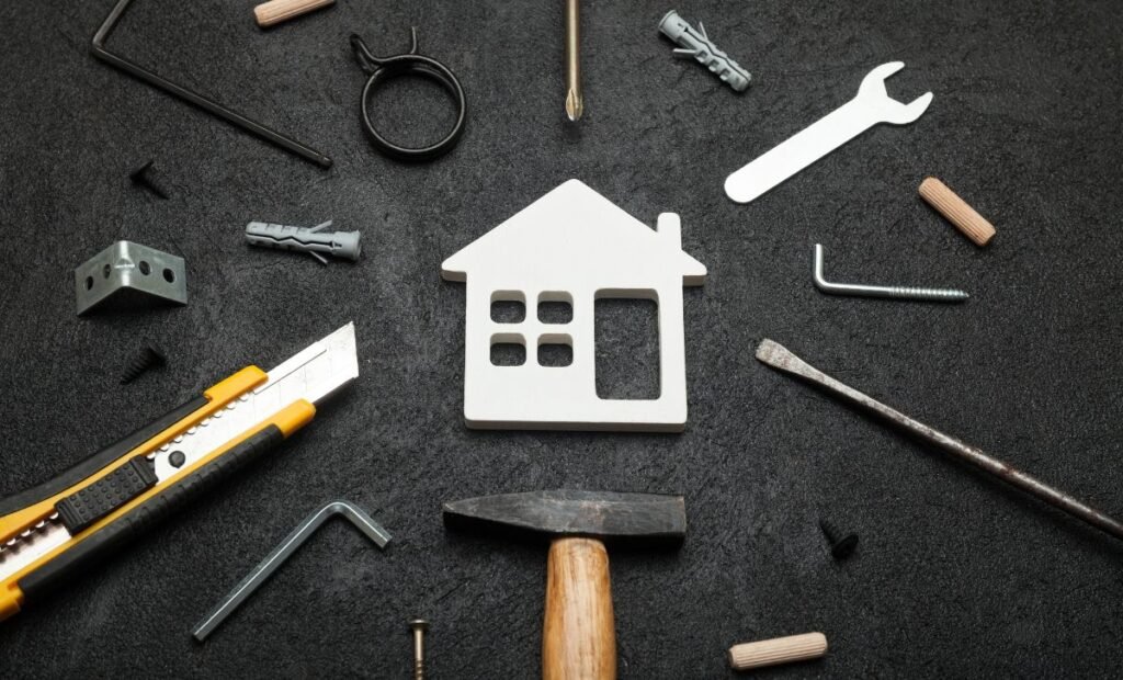 A small white house icon surrounded by various tools - Express Capital Financing