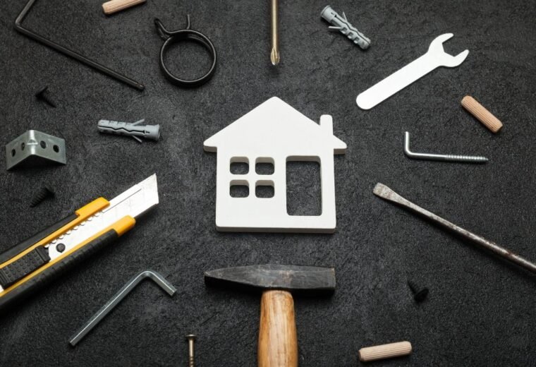A small outline of a house surrounded by tools - Express Capital Financing